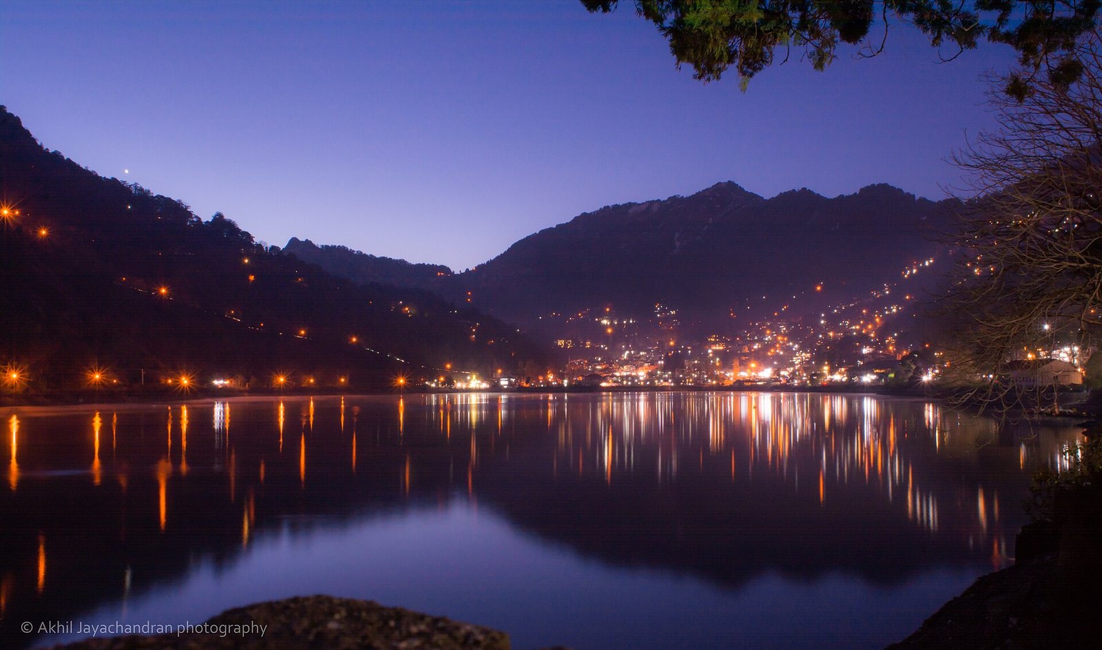 Nainital town lights reflecting on the lake at night